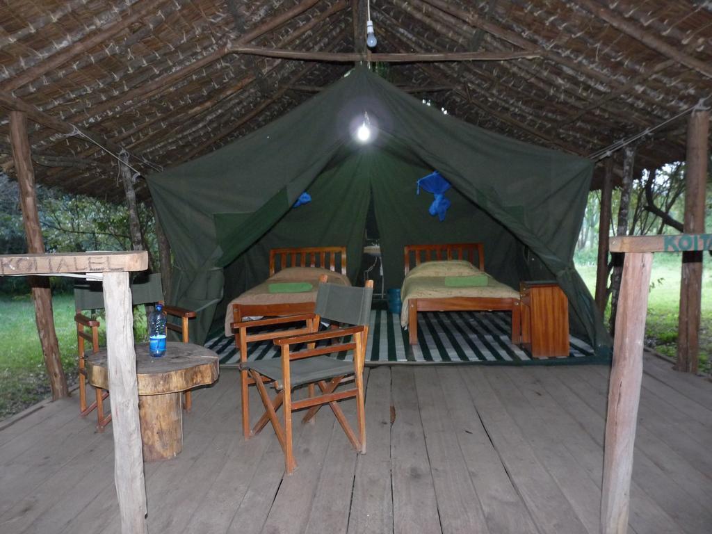 Hotel Enchoro Wildlife Camp à Ololaimutiek Extérieur photo